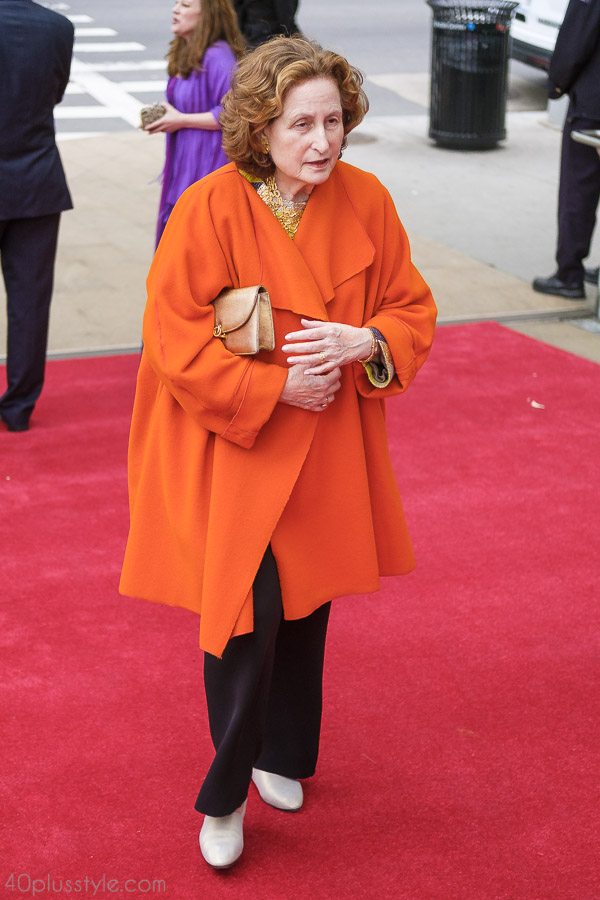 Bright colored coats and wraps make a bold outfit | 40plusstyle.com