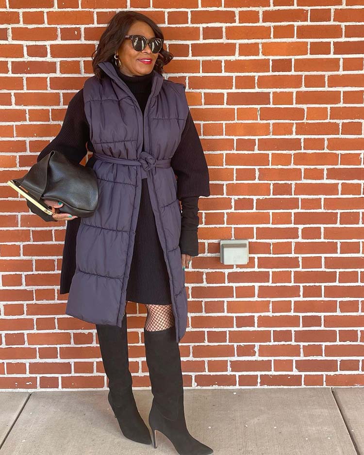 Eugenia wears knee length boots | 40plusstyle.com