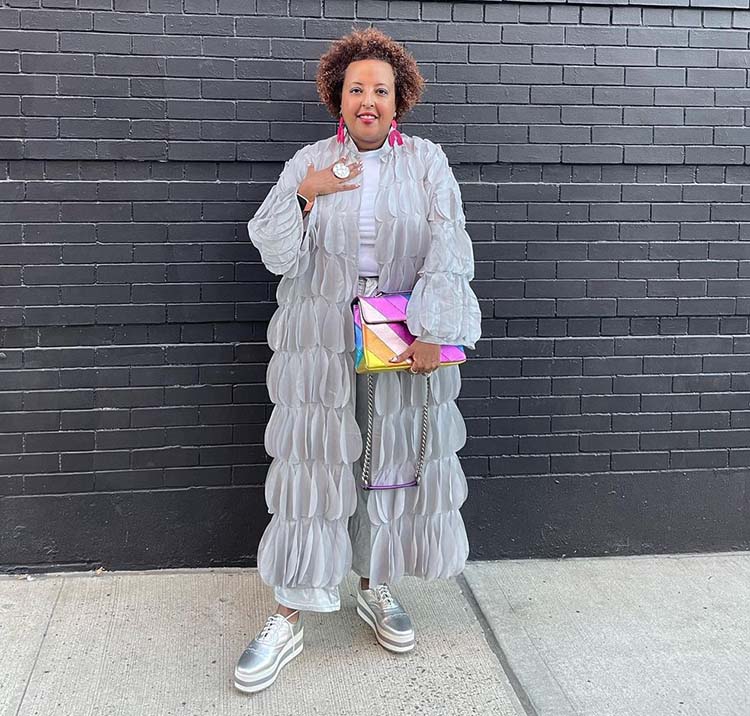 Lydia wearing a statement outerwear | 40plusstyle.com