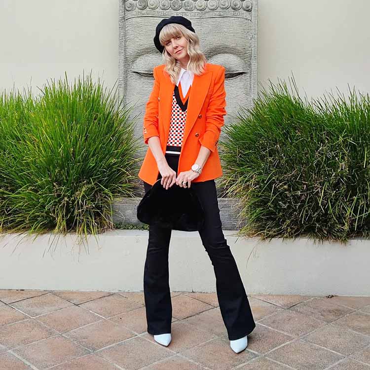2024 color trends - Melissa wears an orange, preppy inspired outfit | 40plusstyle.com
