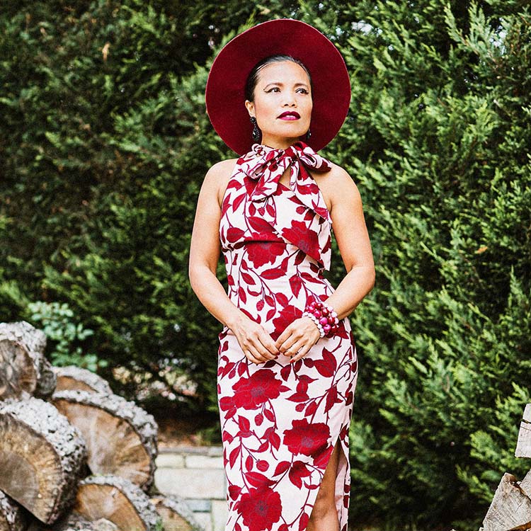 Souri wears a red print dress | 40plusstyle.com