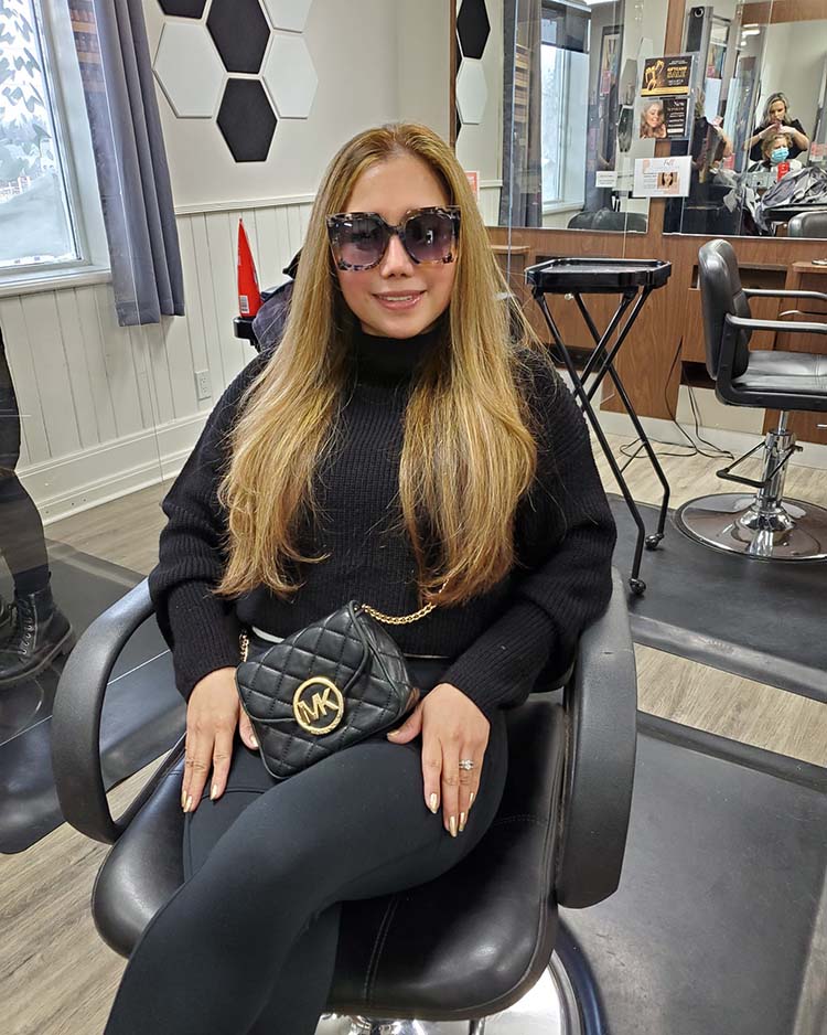 Suzette wears a black outfit | 40plusstyle.com